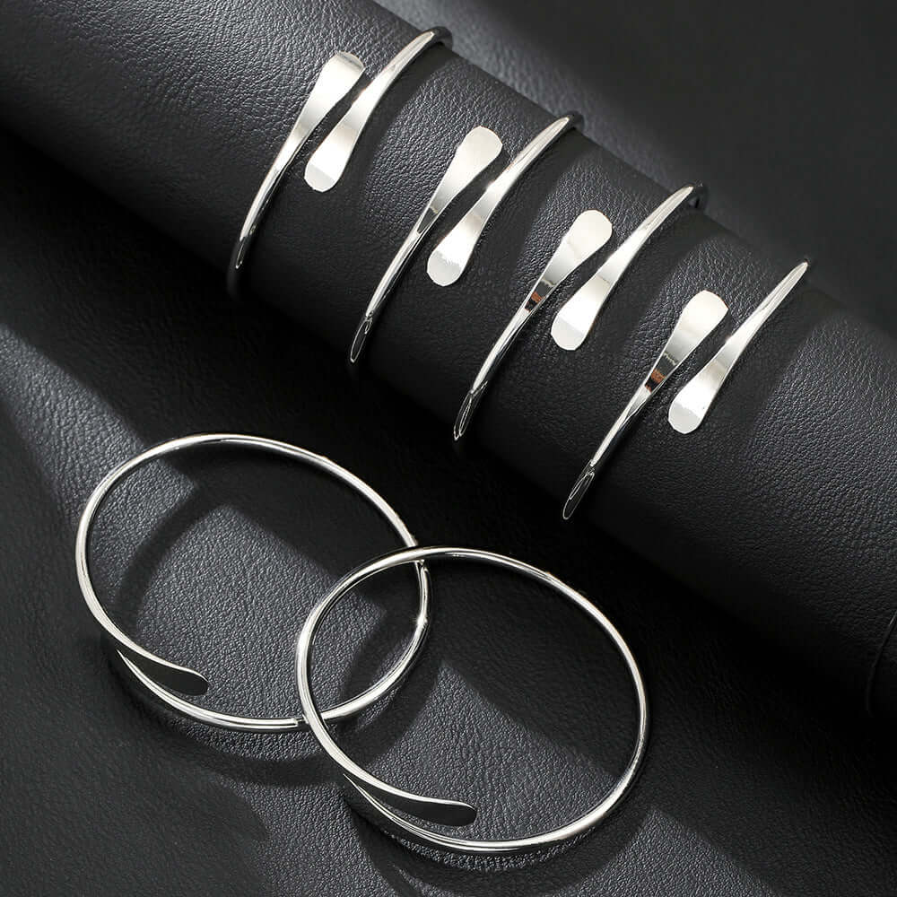 A Set of Six Gold or White Open Alloy Bracelet