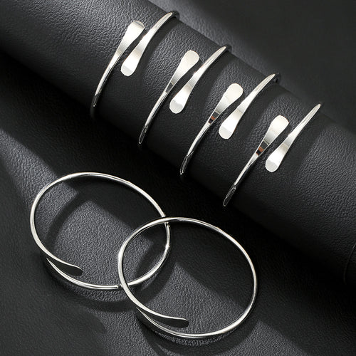 A Set of Six Gold or White Open Alloy Bracelet